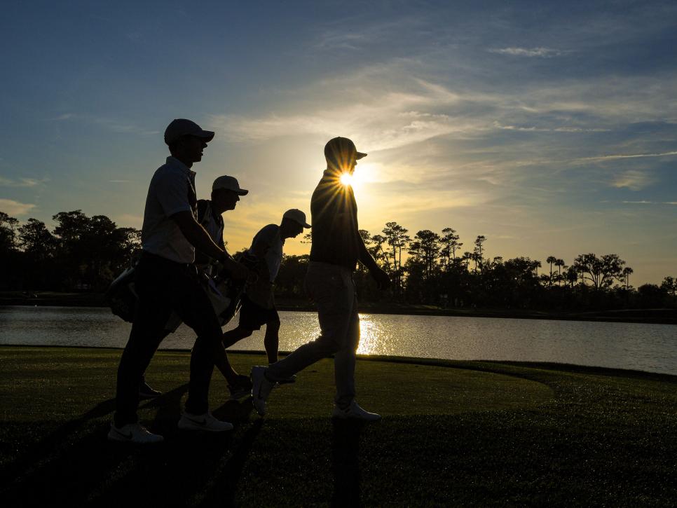 rory-brooks-rahm-players-2020-thursday-sunset-18th-sawgrass.jpg