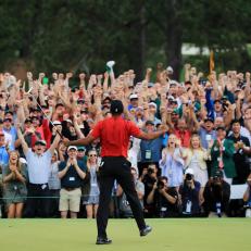 AUGUSTA, GEORGIA - APRIL 14: Tiger Woods of the United States celebrates after sinking his putt on the 18th green to win during the final round of the Masters at Augusta National Golf Club on April 14, 2019 in Augusta, Georgia. (Photo by David Cannon/Getty Images)