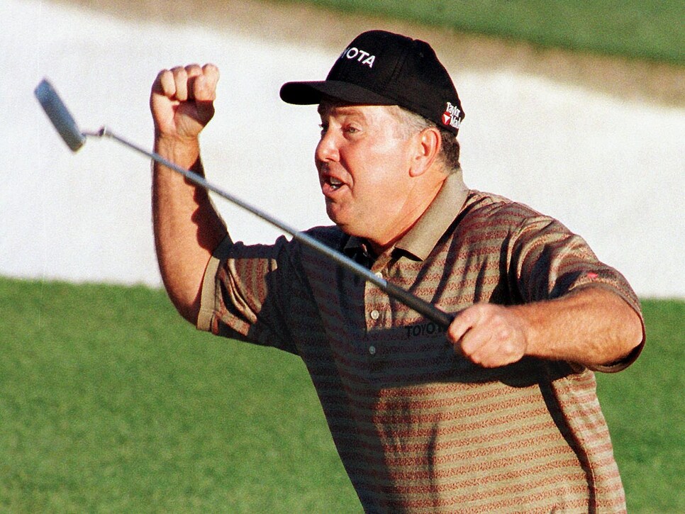 Mark O'Meara of the US reacts to making a birdie p