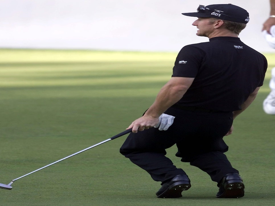 David Duval of the US reacts to missing a birdie p