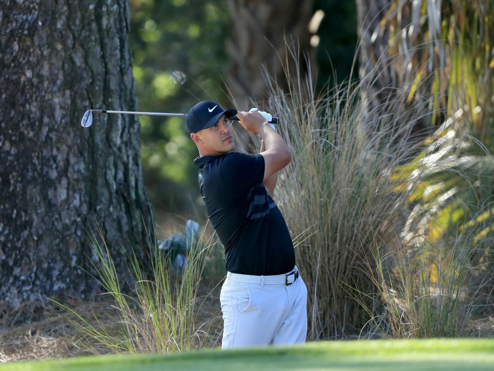 PONTE VEDRA BEACH, FLORIDA - MARCH 12: Brooks Koepka hits a shot on the 10th hole during the first round of The PLAYERS at the TPC Stadium course on March 12, 2020 in Ponte Vedra Beach, Florida. (Photo by Sam Greenwood/Getty Images)
