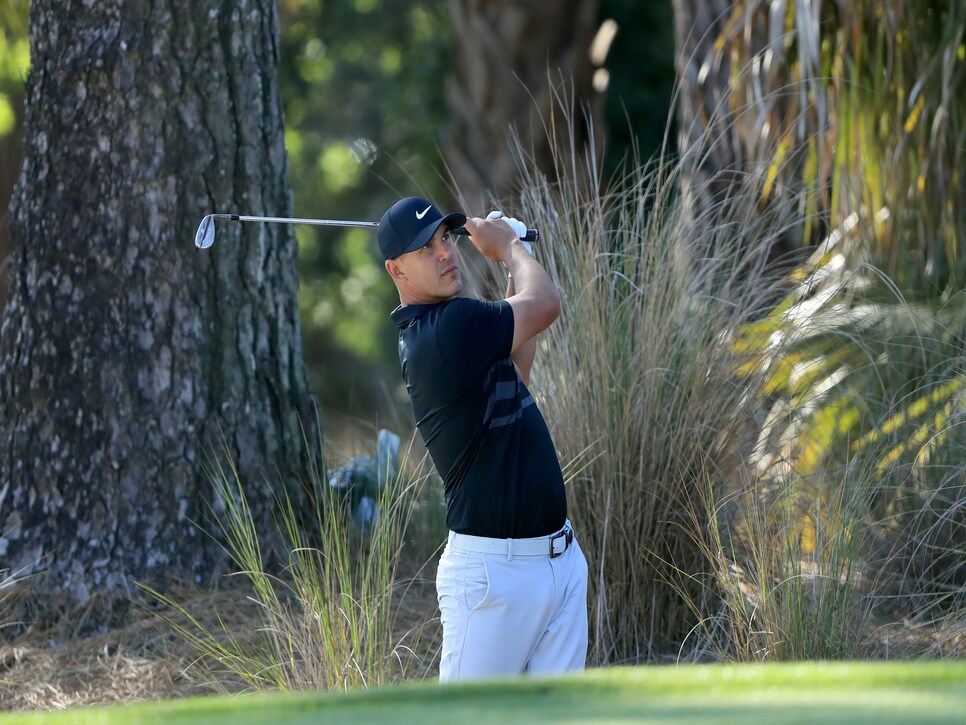 PONTE VEDRA BEACH, FLORIDA - MARCH 12: Brooks Koepka hits a shot on the 10th hole during the first round of The PLAYERS at the TPC Stadium course on March 12, 2020 in Ponte Vedra Beach, Florida. (Photo by Sam Greenwood/Getty Images)