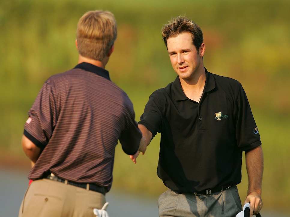 trevor-immelman-presidents-cup-2005-david-toms.jpg