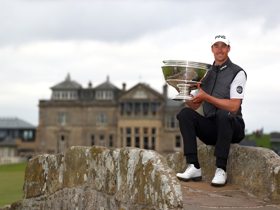 ST ANDREWS, SCOTLAND - SEPTEMBER 29: Winner, Victor Perez of France poses with the trophy on the Swilken Bridge on the 18th hole  during Day four of the Alfred Dunhill Links Championship at The Old Course on September 29, 2019 in St Andrews, United Kingdom. (Photo by Matthew Lewis/Getty Images)