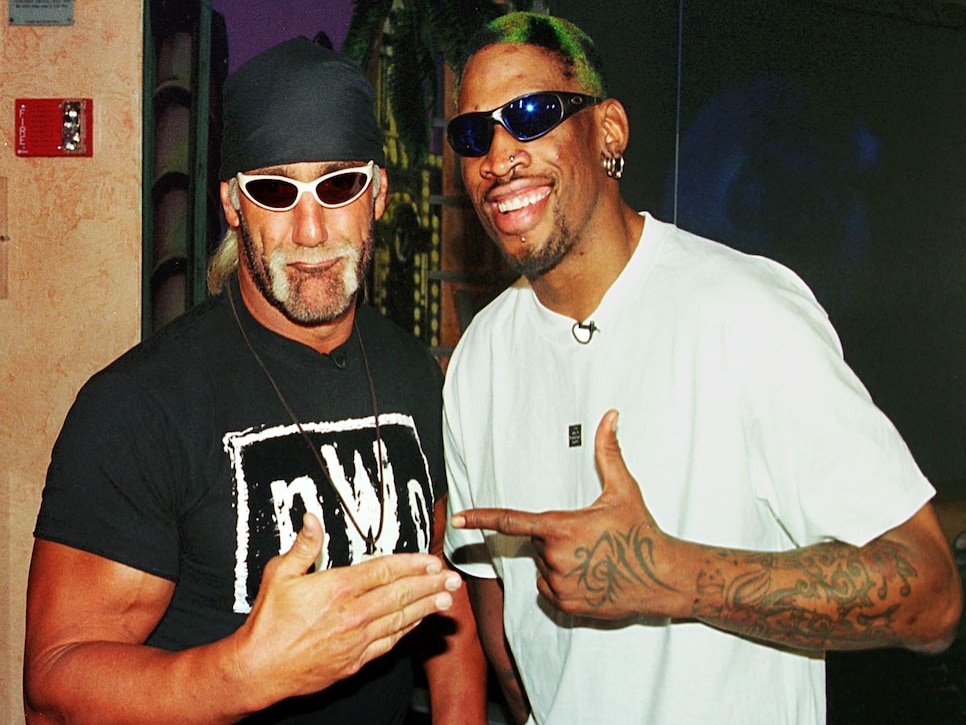 Professional basketball player Dennis Rodman (R) o