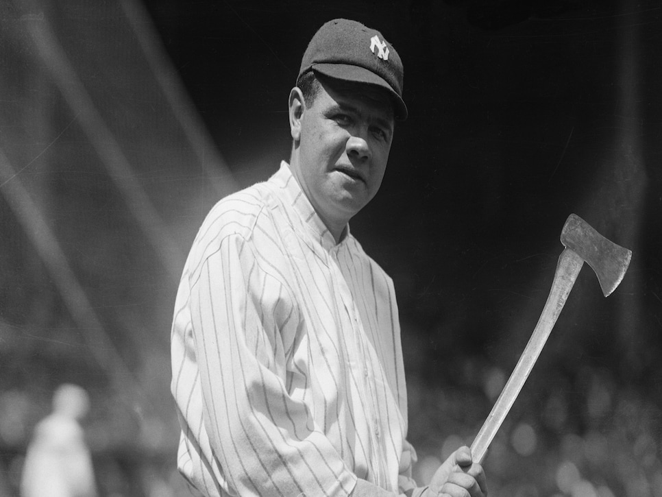 Babe Ruth Holding Baseball Bat by Bettmann