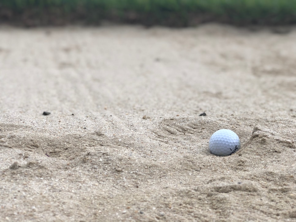 /content/dam/images/golfdigest/fullset/2020/05/01/plugged-ball-bunker.jpg