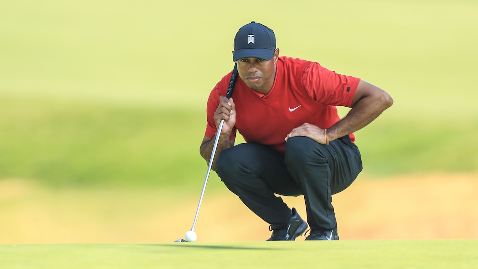 PACIFIC PALISADES, CALIFORNIA - FEBRUARY 16: Tiger Woods of the United States lines up a putt on the par 4, 12th hole during the final round of the Genesis Invitational at The Riviera Country Club on February 16, 2020 in Pacific Palisades, California. (Photo by David Cannon/Getty Images)