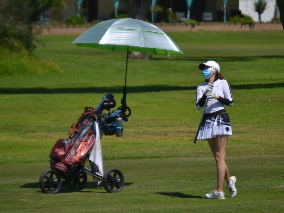 /content/dam/images/golfdigest/fullset/2020/05/junior-golf-san-diego-swinging-wearing-mask.jpg