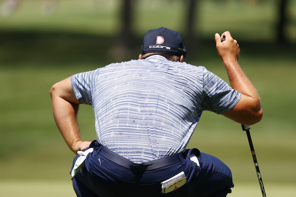 logo on dechambeau hat