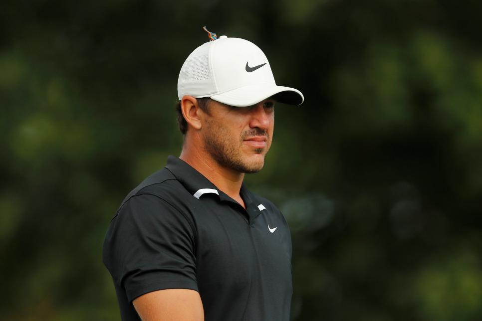 Brooks Koepka looks on at the 13th hole during the second round of the Worl...