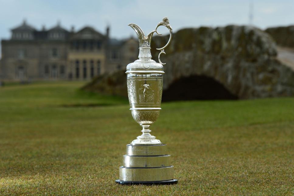 ST ANDREWS, SCOTLAND - APRIL 20 : The Claret Jug sits by the Swilcan Bridge on the 18th fairway in front of the famous St Andrews club house building, during the Open Championship Media Day at Fairmont St Andrews on April 20, 2015 in St Andrews, Scotland. (Photo by Mark Runnacles/Getty Images)
