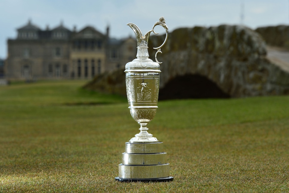 ST ANDREWS, SCOTLAND - APRIL 20 : The Claret Jug sits by the Swilcan Bridge on the 18th fairway in front of the famous St Andrews club house building, during the Open Championship Media Day at Fairmont St Andrews on April 20, 2015 in St Andrews, Scotland. (Photo by Mark Runnacles/Getty Images)