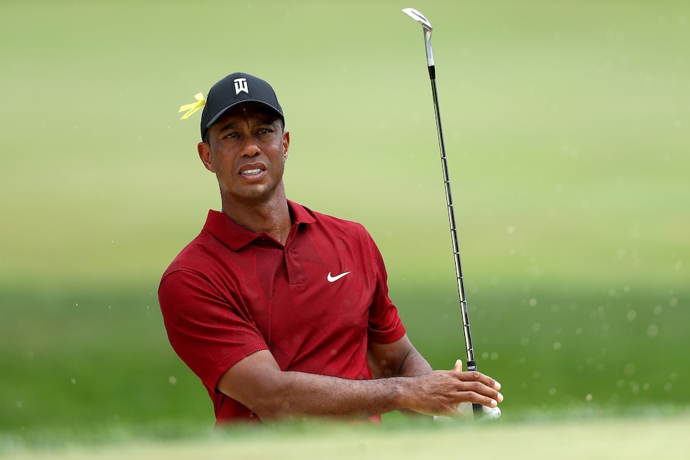 Tiger Woods says there's work to do with his putter after closing 76 ...