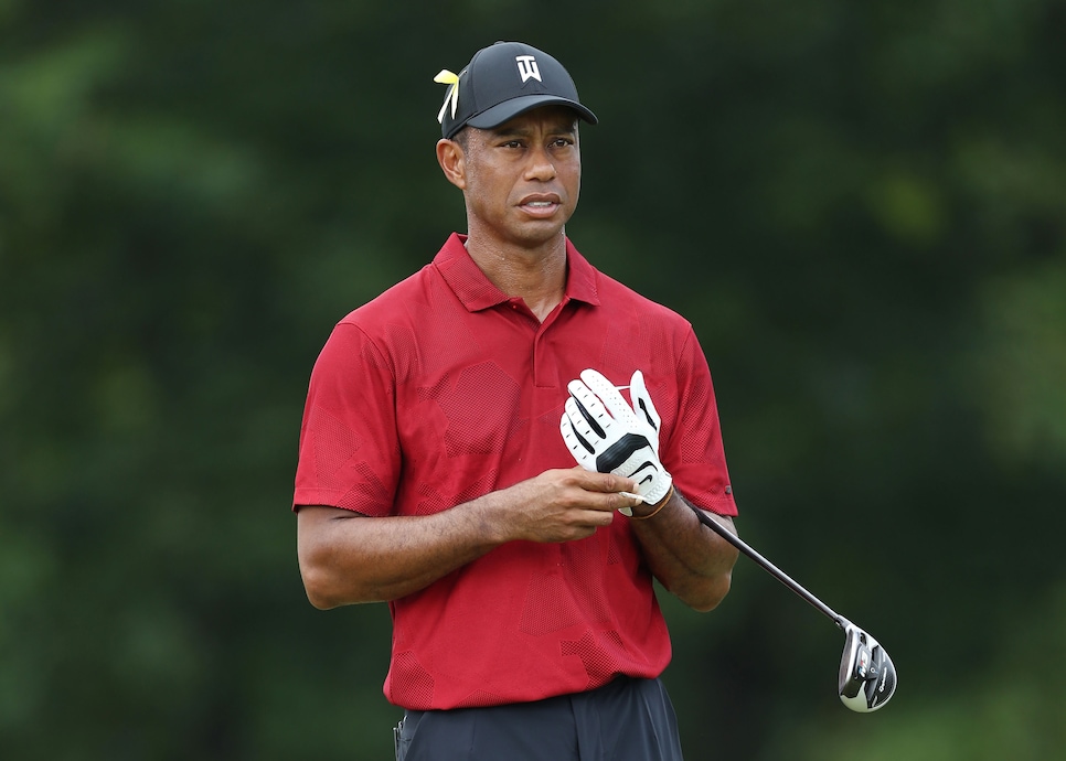 Tiger Woods says there's work to do with his putter after closing 76 ...