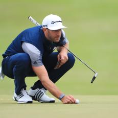SAN FRANCISCO, CALIFORNIA - AUGUST 09: Dustin Johnson of the United States lines up a putt on the 15th hole during the final round of the 2020 PGA Championship at TPC Harding Park on August 09, 2020 in San Francisco, California. (Photo by Tom Pennington/Getty Images)