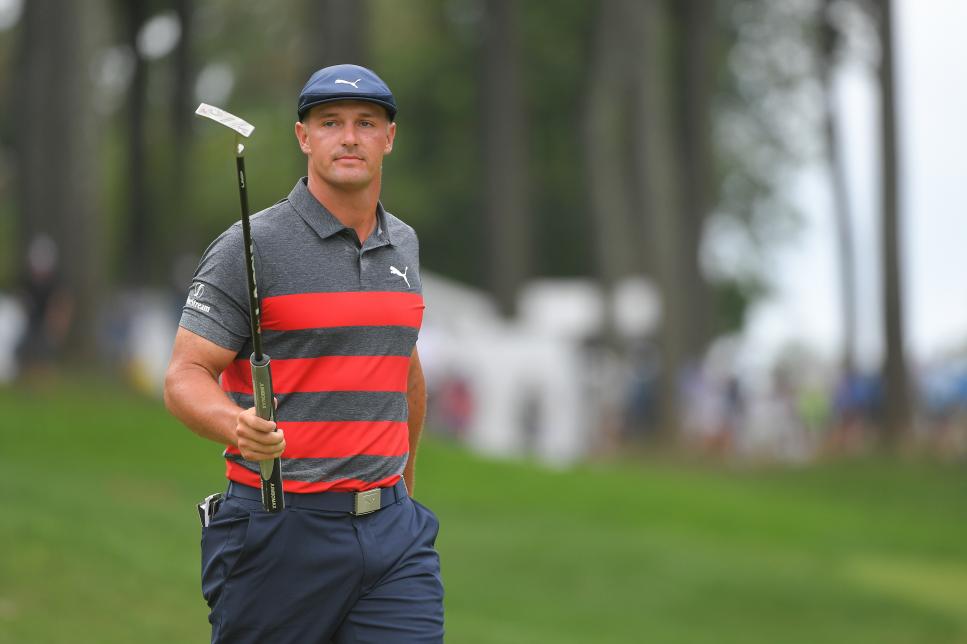 OWINGS MILLS, MD - AUGUST 29: Bryson DeChambeau raises his putter on the first green during the final round of the BMW Championship at Caves Valley Golf Club on August 29, 2021 in Owings Mills, Maryland. (Photo by Ben Jared/PGA TOUR via Getty Images)