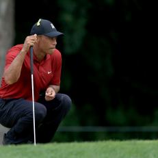 DUBLIN, OHIO - JULY 19: Tiger Woods of the United States lines up a putt on the second green during the final round of The Memorial Tournament on July 19, 2020 at Muirfield Village Golf Club in Dublin, Ohio. (Photo by Sam Greenwood/Getty Images)