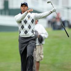 SAN FRANCISCO - OCTOBER 10: Tiger Woods of the USA Team follows his second shot at the par 5, 18th hole during the Day Three Morning Foursome Matches in The Presidents Cup at Harding Park Golf Course on October 10, 2009 in San Francisco, California  (Photo by David Cannon/Getty Images)