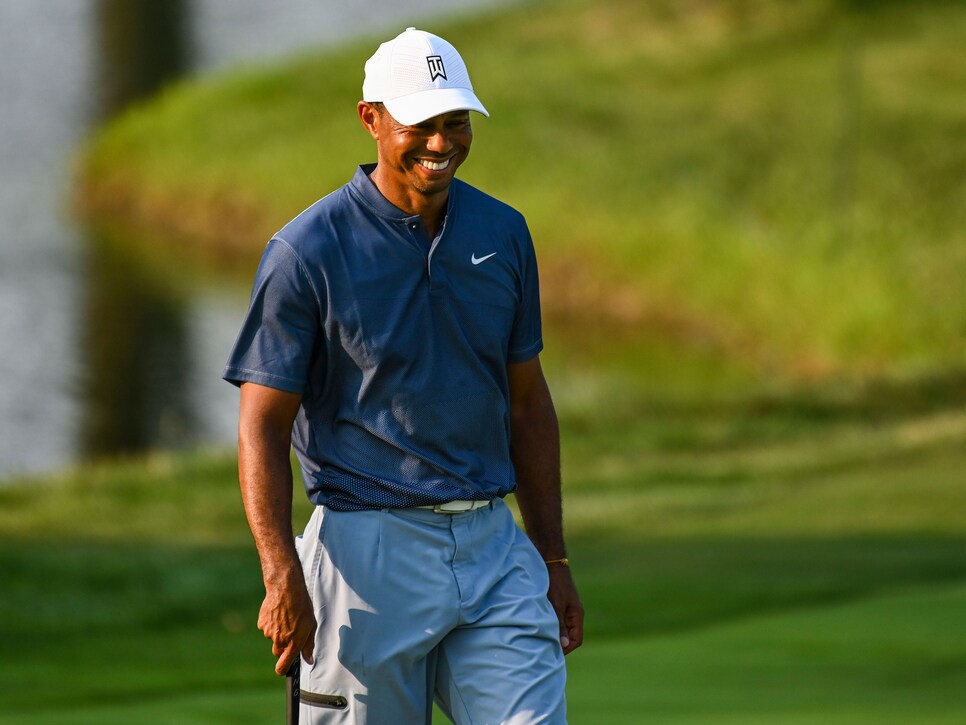 OLYMPIA FIELDS, IL - AUGUST 25:  Tiger Woods smiles on the 18th hole green during a practice round for the BMW Championship on the North Course at Olympia Fields Country Club on August 25, 2020 in Olympia Fields, Illinois. (Photo by Keyur Khamar/PGA TOUR via Getty Images)