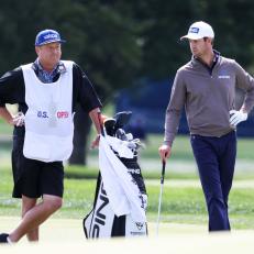 MAMARONECK, NEW YORK - SEPTEMBER 20: Harris English of the United States waits with caddie Eric Larson (L) on the first hole during the final round of the 120th U.S. Open Championship on September 19, 2020 at Winged Foot Golf Club in Mamaroneck, New York. (Photo by Jamie Squire/Getty Images)
