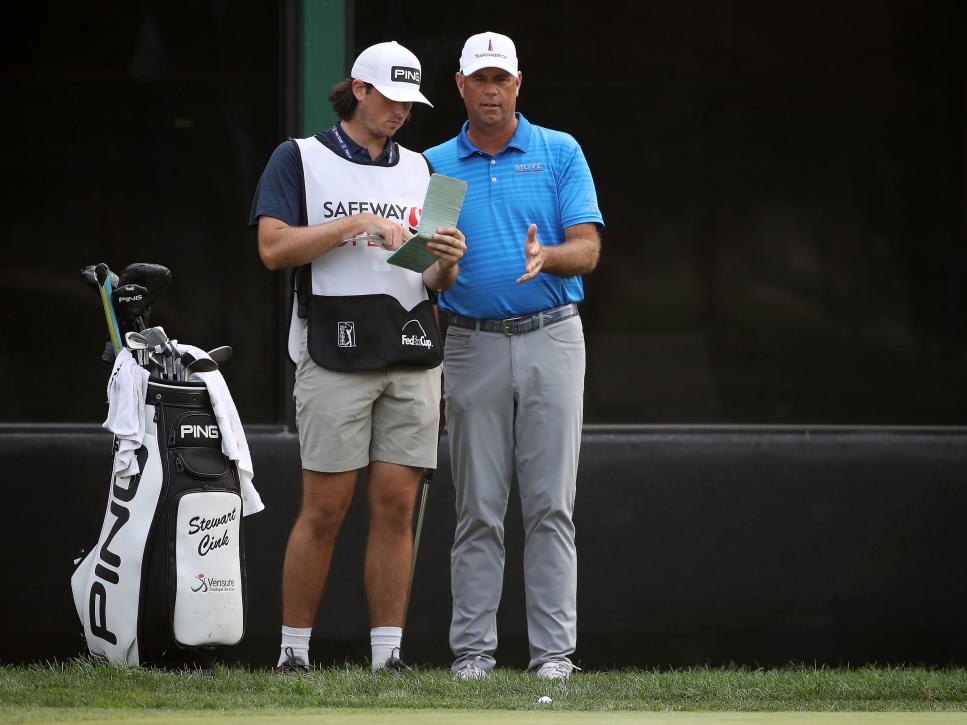 NAPA, CALIFORNIA - SEPTEMBER 13: Stewart Cink stands with his son Reagan as his caddie on the 18th hole during the final round of the Safeway Open at Silverado Resort on September 13, 2020 in Napa, California. (Photo by Sean M. Haffey/Getty Images)