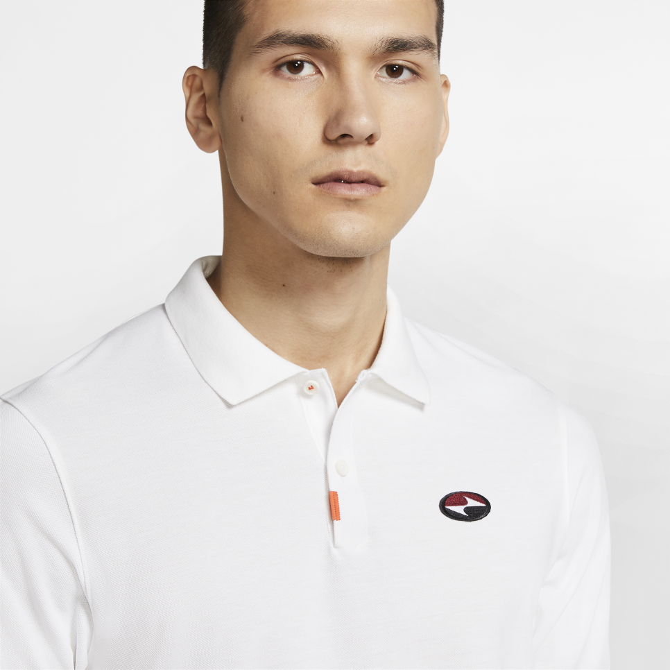 /content/dam/images/golfdigest/fullset/2020/09/x-br/14/20200914-Tiger-Woods-Nike-yin-yang-polo.PNG