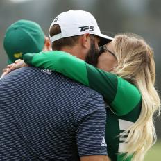 AUGUSTA, GEORGIA - NOVEMBER 15: Dustin Johnson of the United States kisses fiancÃ©e Paulina Gretzky after winning the Masters at Augusta National Golf Club on November 15, 2020 in Augusta, Georgia. (Photo by Patrick Smith/Getty Images)
