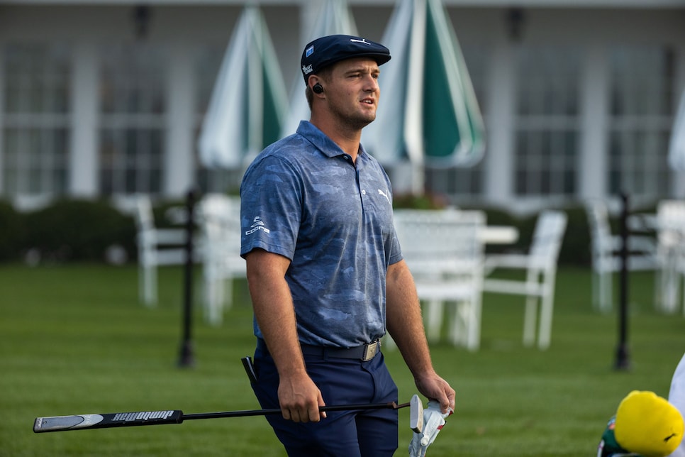 /content/dam/images/golfdigest/fullset/2020/11/bryson-dechambeau-masters-2020-sunday-walking-ear-phones.jpg