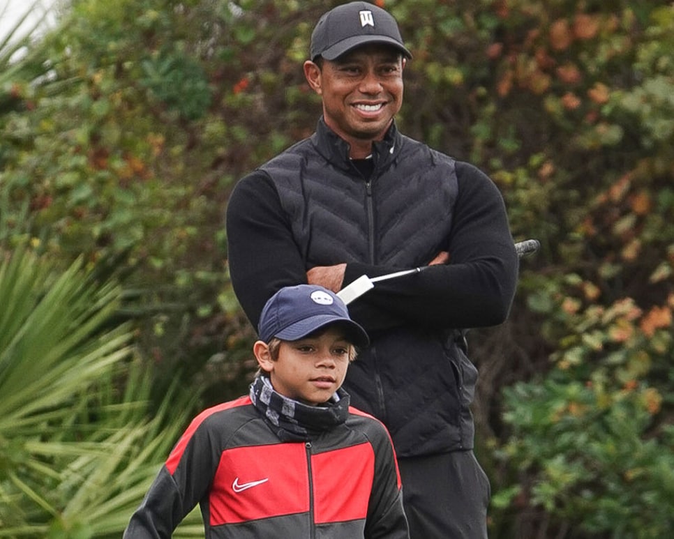 /content/dam/images/golfdigest/fullset/2020/12/charlie-woods-tiger-woods-pnc-championship-2020-thursday-pro-am-smile.jpg