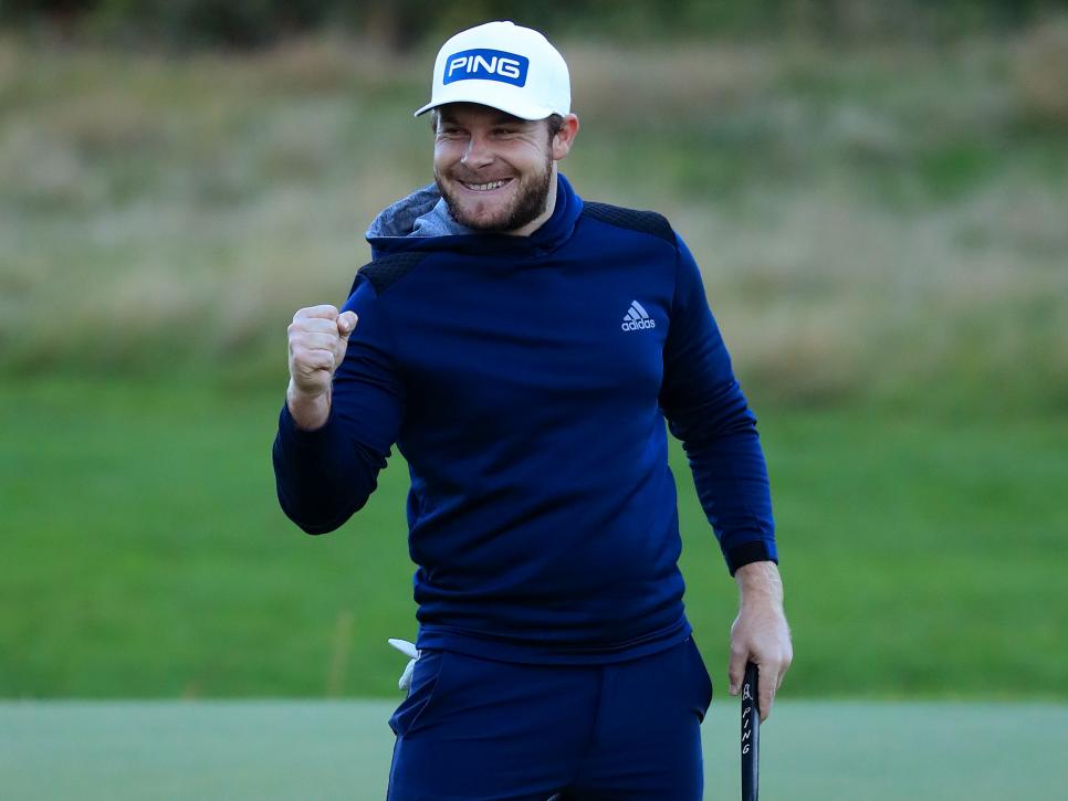 VIRGINIA WATER, ENGLAND - OCTOBER 11: Tyrrell Hatton of England celebrates on the 18th green during Day Four of the BMW PGA Championship at Wentworth Golf Club on October 11, 2020 in Virginia Water, England. (Photo by Andrew Redington/Getty Images)