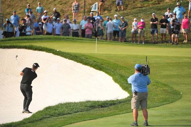 Tour-pro spin from bunkers, explained | How To Play Golf | GolfDigest.com