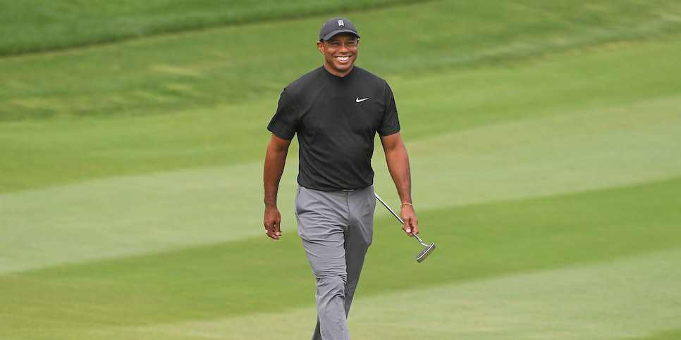 THOUSAND OAKS, CA - OCTOBER 22: Tiger Woods smiles after making a long putt on the 14th green during the first round of the ZOZO CHAMPIONSHIP @ SHERWOOD at Sherwood Country Club on October 22, 2020 in Thousand Oaks, California. (Photo by Ben Jared/PGA TOUR via Getty Images)