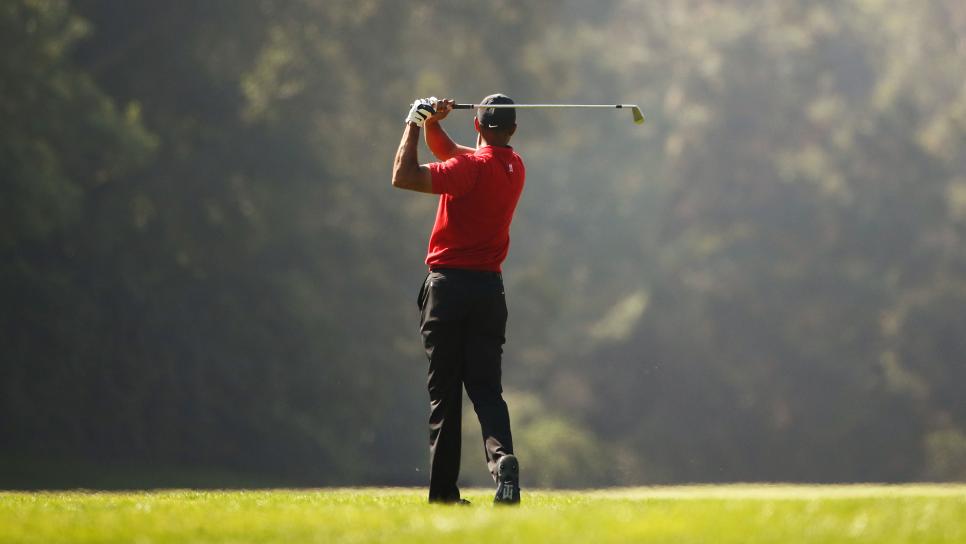 PACIFIC PALISADES, CALIFORNIA - FEBRUARY 16: Tiger Woods of the United States plays a shot on the 12th hole during the final round of the Genesis Invitational on February 16, 2020 in Pacific Palisades, California. (Photo by Katelyn Mulcahy/Getty Images)
