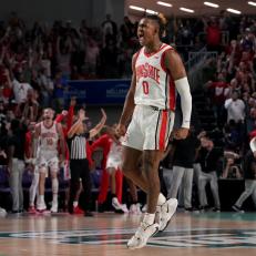 FORT MYERS, FLORIDA - NOVEMBER 22: Meechie Johnson Jr. #0 of the Ohio State Buckeyes reacts after hitting the game winning three point shot against the Seton Hall Pirates in the second half of Day One of The Fort Myers Tip-Off at Suncoast Credit Union Arena on November 22, 2021 in Fort Myers, Florida. (Photo by Mark Brown/Getty Images)