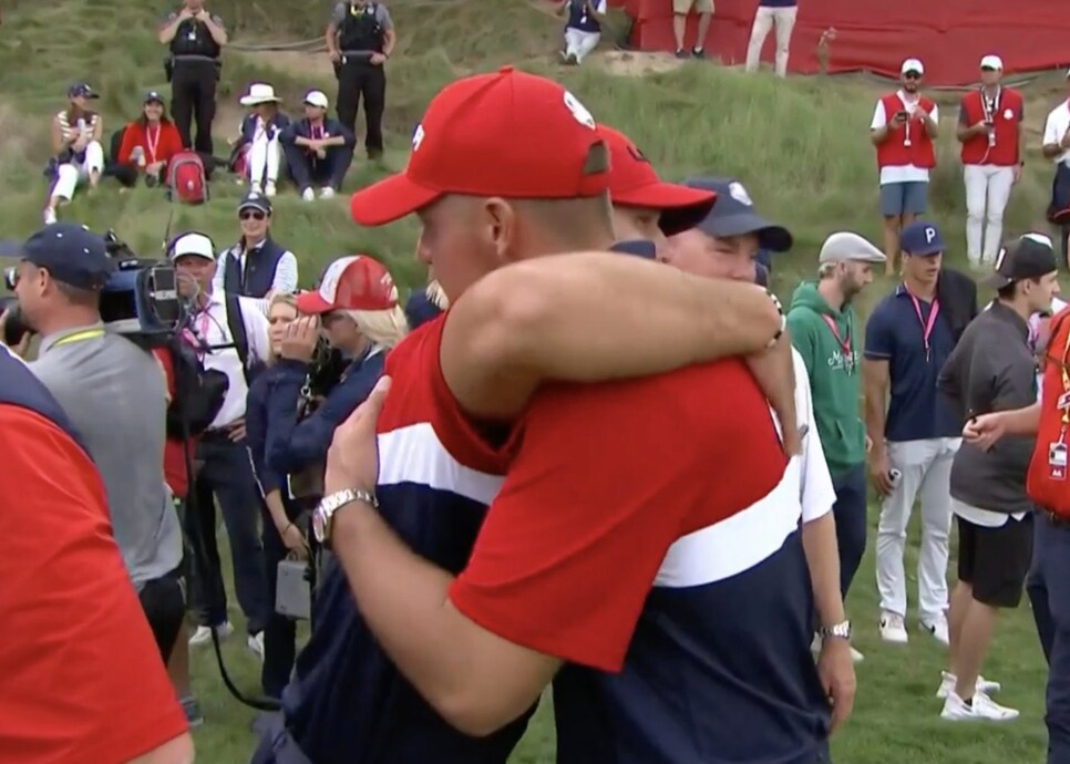 /content/dam/images/golfdigest/fullset/2021/211207-brooks-brysonhug.png