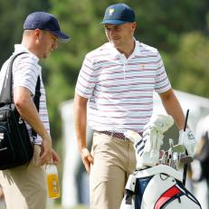 CHARLOTTE, NORTH CAROLINA - SEPTEMBER 19: Justin Thomas of the United States Team and Jordan Spieth of the United States Team talk on the range prior to the 2022 Presidents Cup at Quail Hollow Country Club on September 19, 2022 in Charlotte, North Carolina. (Photo by Jared C. Tilton/Getty Images)