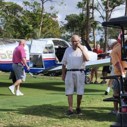 Plane forced to make emergency landing on golf course, golfers push it off green so they can finish the hole