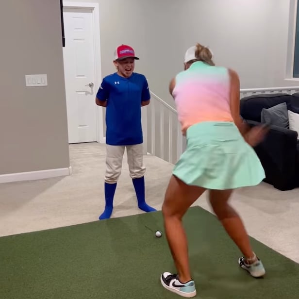 brave-kid-lets-big-sister-yank-out-his-loose-tooth-by-blasting-golf-shot