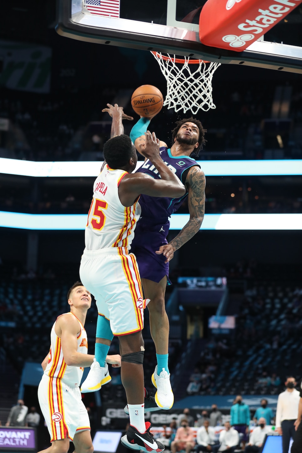 Watch former Rockets center Clint Capela get obliterated by a Miles Bridges  dunk