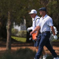 PONTE VEDRA BEACH, FL - MARCH 13:  Bryson DeChambeau and his caddie walk down the second hole during the third round of THE PLAYERS Championship on THE PLAYERS Stadium Course at TPC Sawgrass on March 13, 2021, in Ponte Vedra Beach, FL. (Photo by Ben Jared/PGA TOUR via Getty Images)