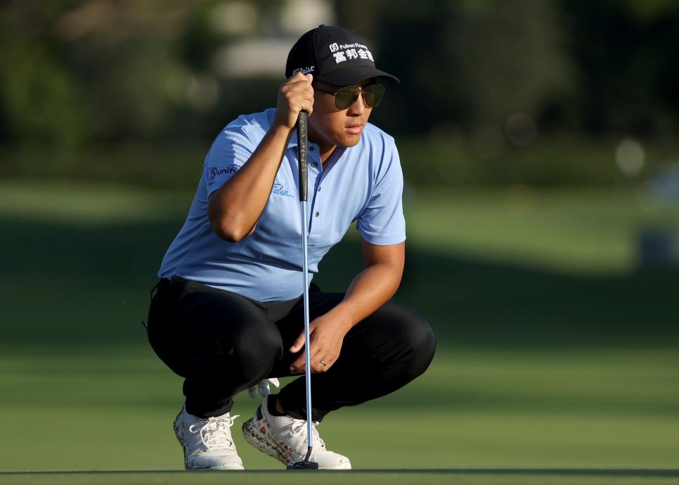 HONOLULU, HAWAII - JANUARY 15: C.T. Pan of Taiwan lines up a putt on the 13th green during the second round of the Sony Open in Hawaii at the Waialae Country Club on January 15, 2021 in Honolulu, Hawaii. (Photo by Gregory Shamus/Getty Images)