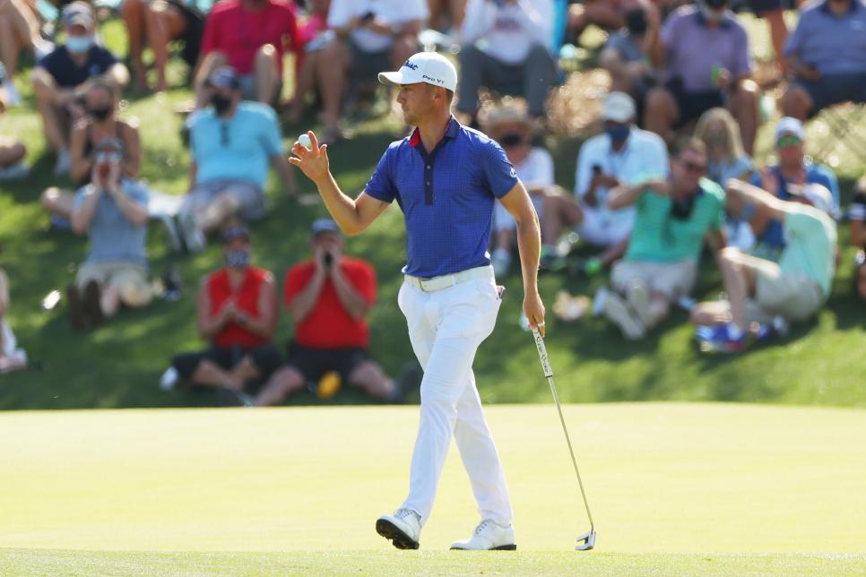 PONTE VEDRA BEACH, FLORIDA - MARCH 14: Justin Thomas of the United States reacts to his eagle putt on the 11th green during the final round of THE PLAYERS Championship on THE PLAYERS Stadium Course at TPC Sawgrass on March 14, 2021 in Ponte Vedra Beach, Florida. (Photo by Kevin C. Cox/Getty Images)
