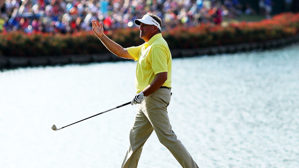 PONTE VEDRA BEACH, FL - MAY 15:  Ken Duke of the United States waves to the crowd on the 17th hole during the final round of THE PLAYERS Championship at the Stadium course at TPC Sawgrass on May 15, 2016 in Ponte Vedra Beach, Florida.  (Photo by Richard Heathcote/Getty Images)