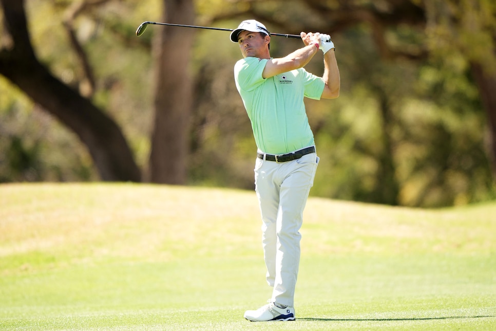 AUSTIN, TEXAS - MARCH 25: Kevin Kisner of the United States plays his shot on the sixth hole in his match against Justin Thomas of the United States during the second round of the World Golf Championships-Dell Technologies Match Play at Austin Country Club on March 25, 2021 in Austin, Texas. (Photo by Darren Carroll/Getty Images)