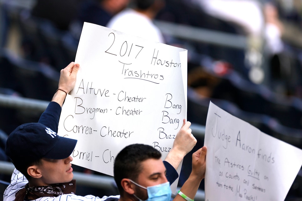 New York Yankees fans bring inflatable trash cans, costumes and