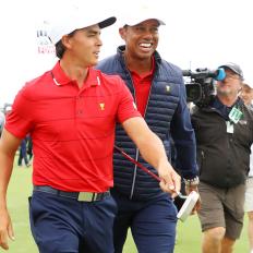 MELBOURNE, AUSTRALIA - DECEMBER 15:  Playing Captain Tiger Woods of the United States team and Rickie Fowler of the United States team celebrate after they won the Presidents Cup 16-14 during Sunday Singles matches on day four of the 2019 Presidents Cup at Royal Melbourne Golf Course on December 15, 2019 in Melbourne, Australia. (Photo by Warren Little/Getty Images)