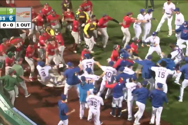 A guy threw a ball at another guy during this rip-snortin' brawl at the South  Bend Cubs game on Tuesday night, This is the Loop