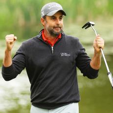 SUTTON COLDFIELD, ENGLAND - MAY 15: Richard Bland of England celebrates after putting in to win the play off on the eighteenth green during the Final Round of The Betfred British Masters hosted by Danny Willett at The Belfry on May 15, 2021 in Sutton Coldfield, England. (Photo by Andrew Redington/Getty Images)