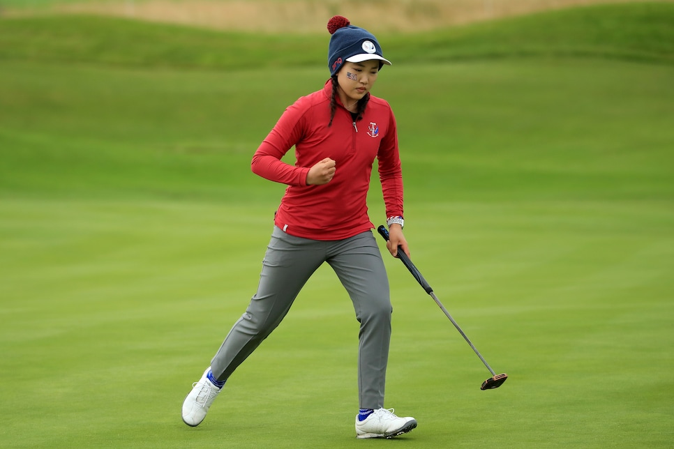 AUCHTERARDER, SCOTLAND - SEPTEMBER 11:  Lucy Li of Team USA celebrates after a putt meaning the match was halved during the PING Junior Solheim Cup during Preview Day 3 of The Solheim Cup at Gleneagles on September 11, 2019 in Auchterarder, Scotland. (Photo by Andrew Redington/WME IMG/WME IMG via Getty Images)